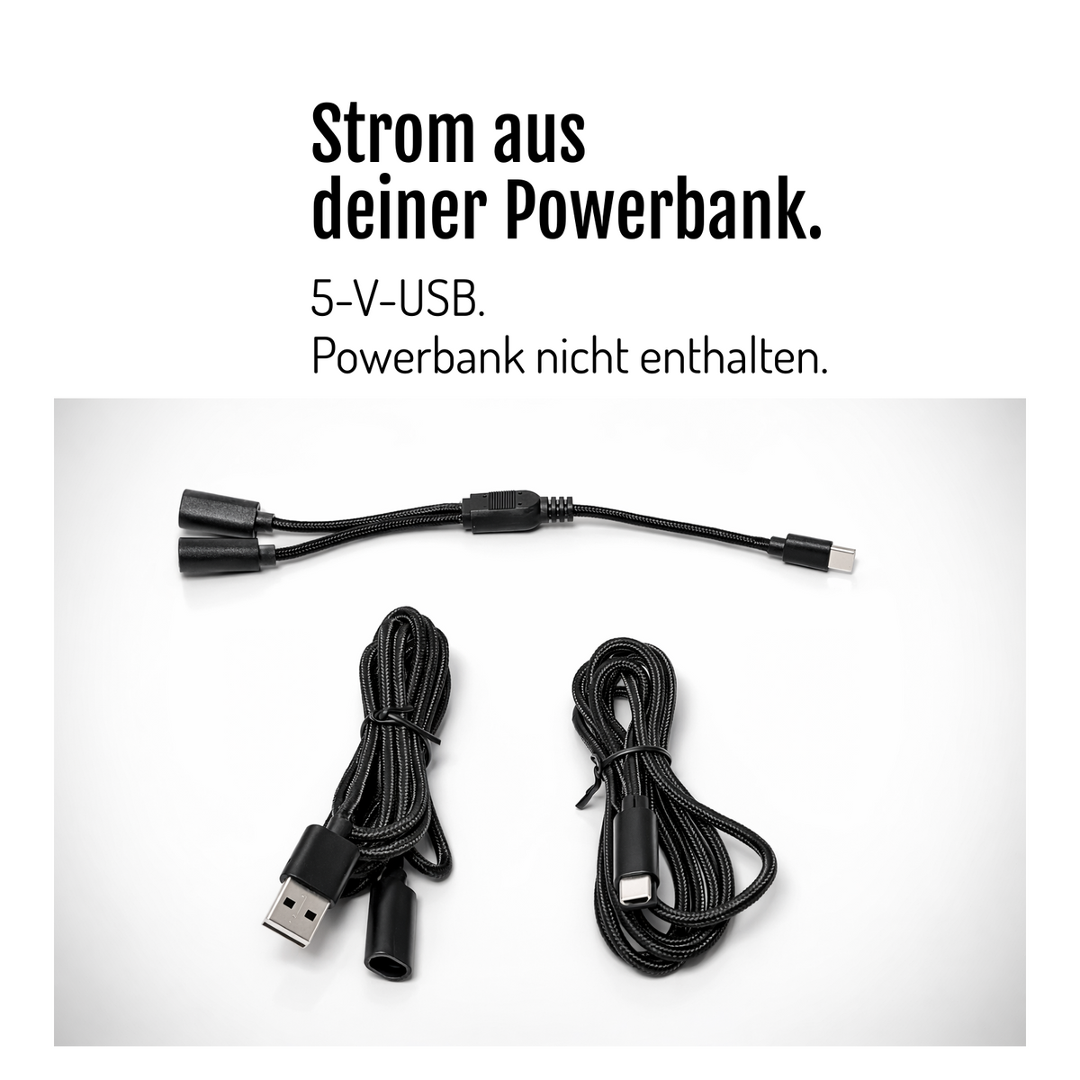 [de] CargoGLOW-Anschlusskabel mit USB-Steckern auf weißem Hintergrund. Stromversorgung über eine 5-V-USB-Powerbank; die Powerbank ist nicht enthalten.