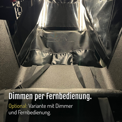 [de] Von CargoGLOW beleuchteter Innenraum mit Sitz und Gurten. Dimmen auch per Fernbedienung: Die Variante mit Dimmer und Fernbedienung ist optional.
